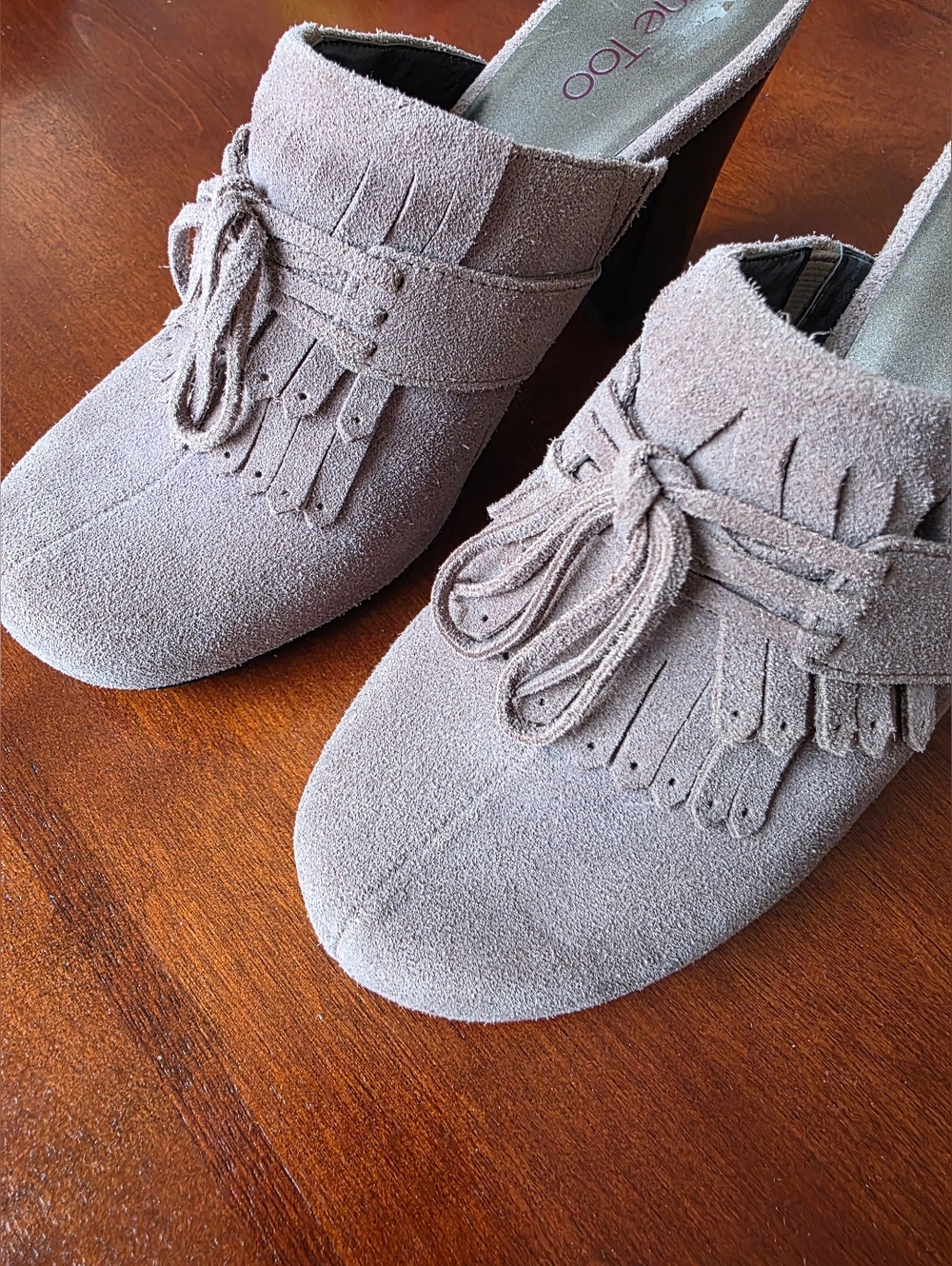 me Too taupe fringe bow suede mule clogs
